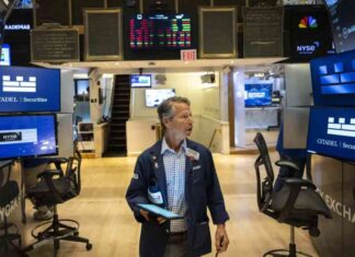 تأثير خفض الفائدة وأرباح الشركات على استقرار سوق وول ستريت